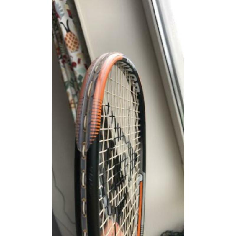 Dunlop Squash racket rarely used. 2 Dunlop balls new